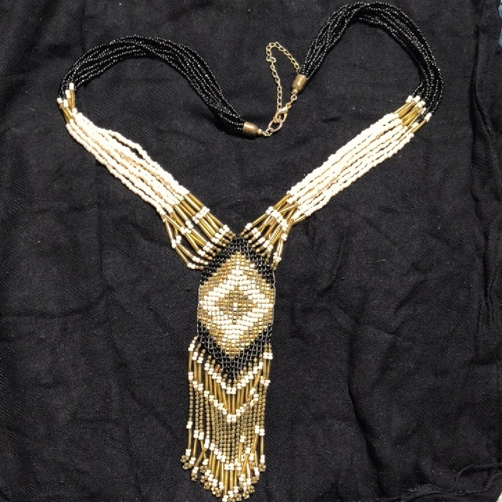 Elegant Beaded Necklace in Black, Gold, and Cream